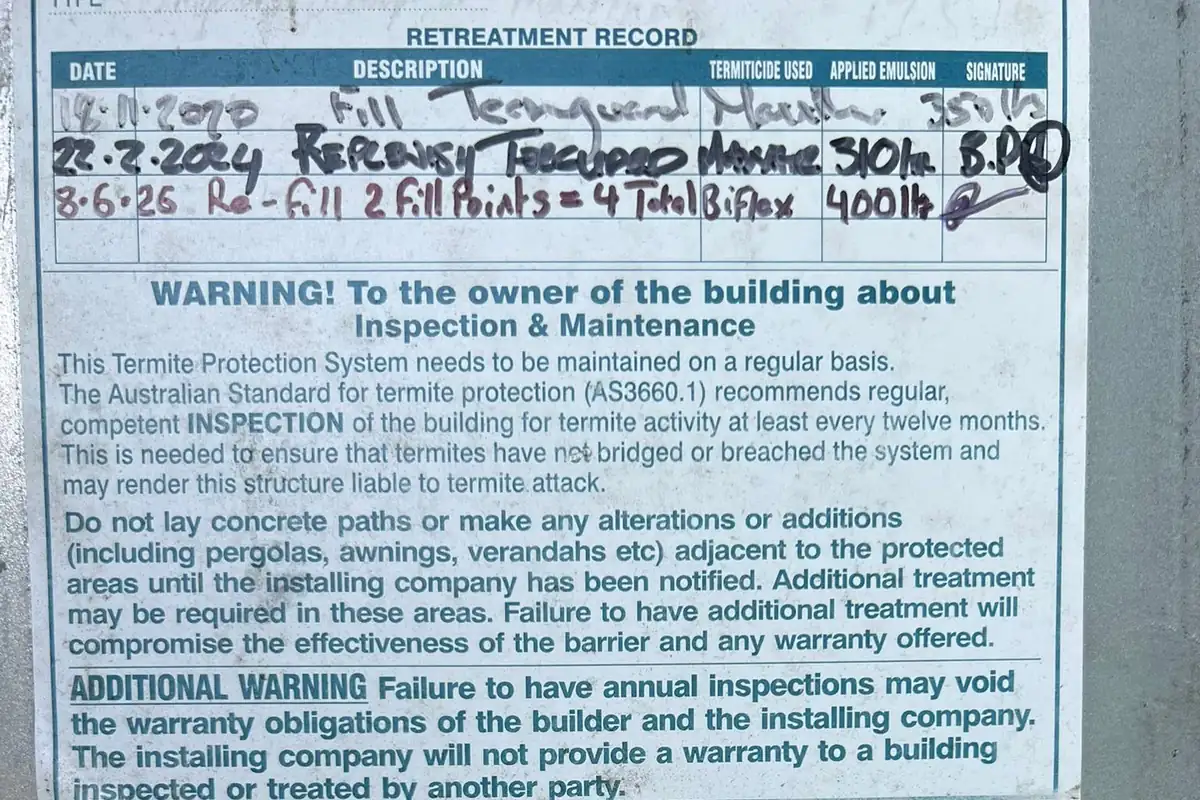 Termite system retreatment record showing dated service history